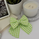 Green gingham handmade dog bow accessory for stylish dogs